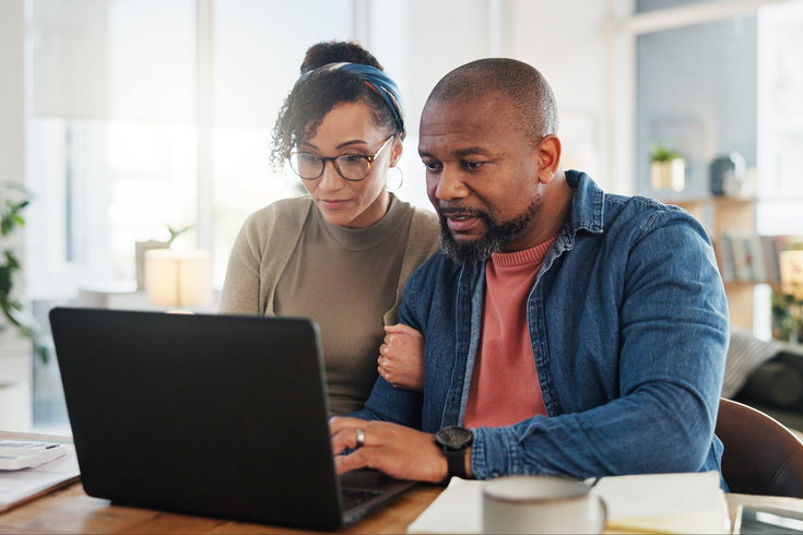 Purchased - couple with budget or household bills planning in home