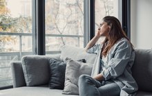 Purchased - Depressed person staring out a window
