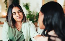 Friends with advice, talking and understanding in living room