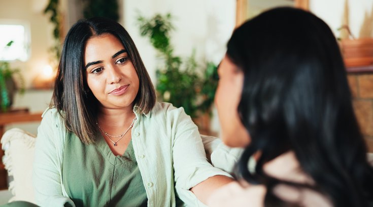 Friends with advice, talking and understanding in living room