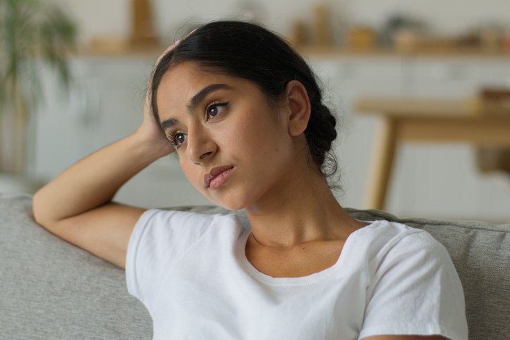 Purchased - Person sitting on the couch bored