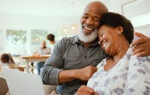 Purchased - Couple looking at plans on a computer
