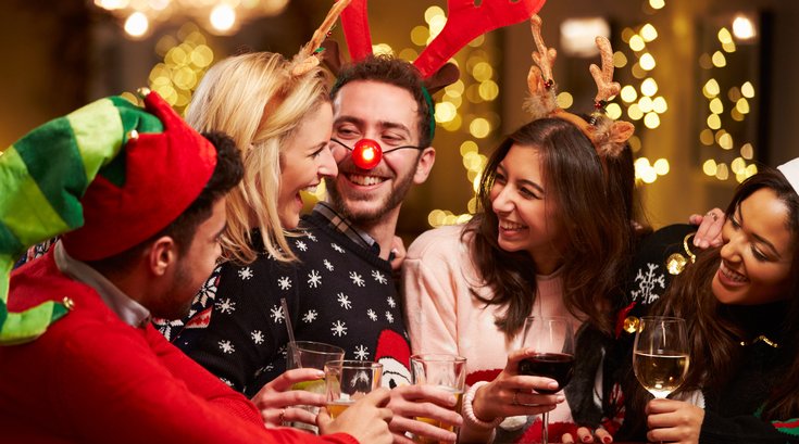 Friends drinking at a bar holiday theme