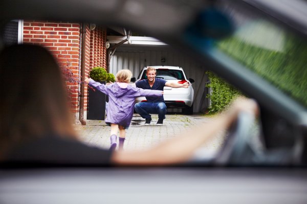 Daughter running towards father