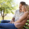 Limited - Couple sitting on a park bench