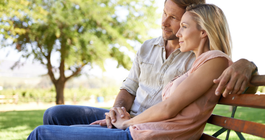 Limited - Couple sitting on a park bench