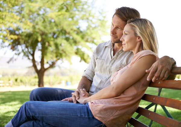 Limited - Couple sitting on a park bench