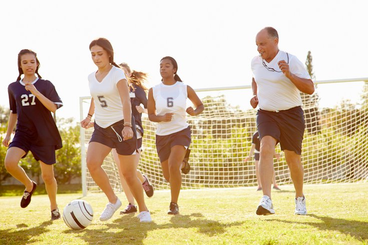 Members Of Female High School Soccer Playing