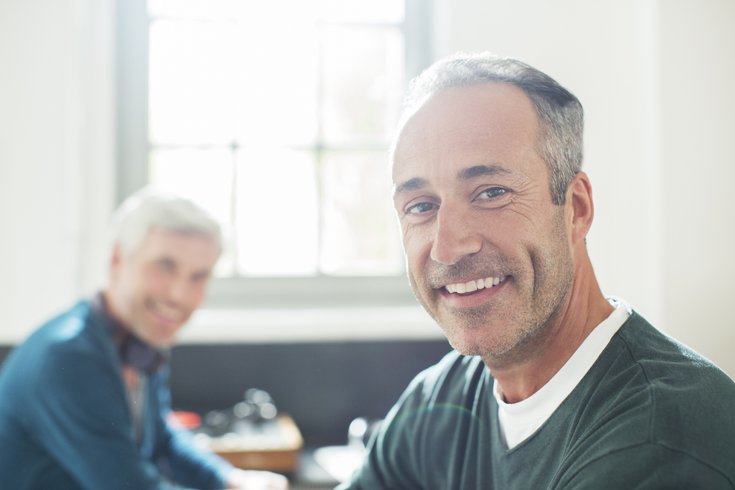 Limited - Couple smiling at camera