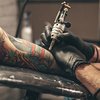 Limited - Male tattooing  image on arm
