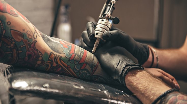 Limited - Male tattooing  image on arm