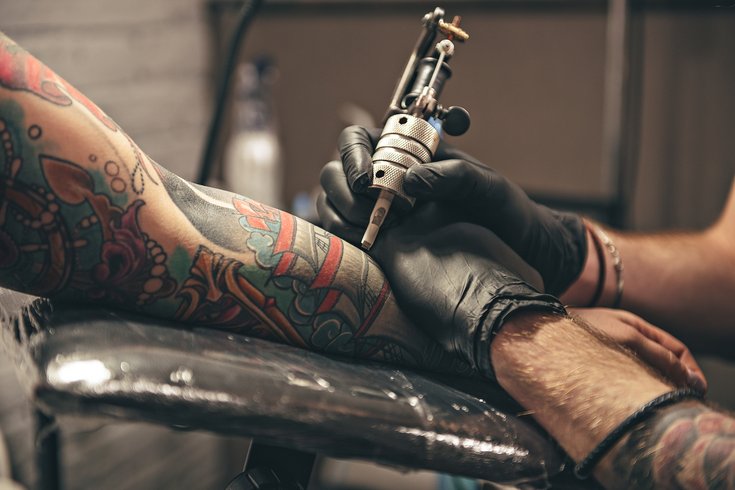 Limited - Male tattooing  image on arm