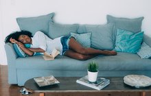 Purchased - Woman taking a nap on a sofa