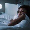 Limited - Woman sleeping in room with nightlight on