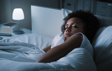 Limited - Woman sleeping in room with nightlight on