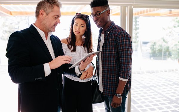 Realtor sharing property details with clients