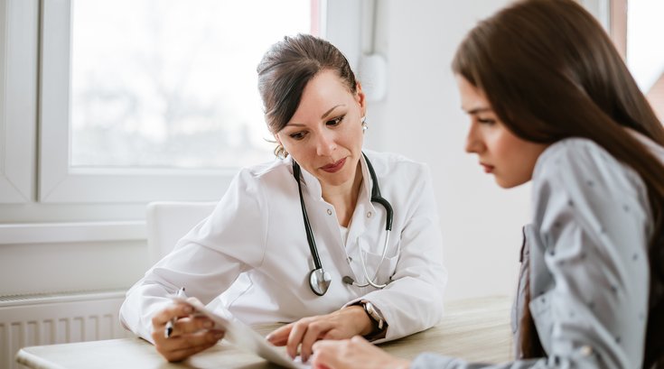 Doctor talking to a patient