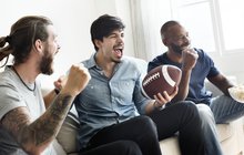Purchased -  Friends watching a football game on the couch