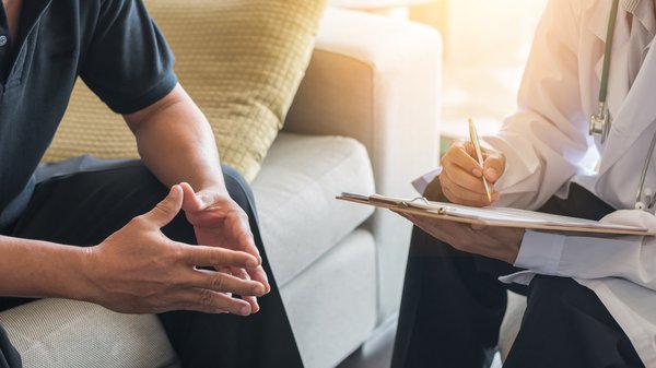 Purchased - Doctor consulting a patient