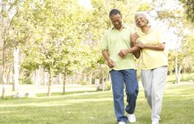 Limited - Senior Couple Walking In Park