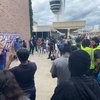 Airport workers rally