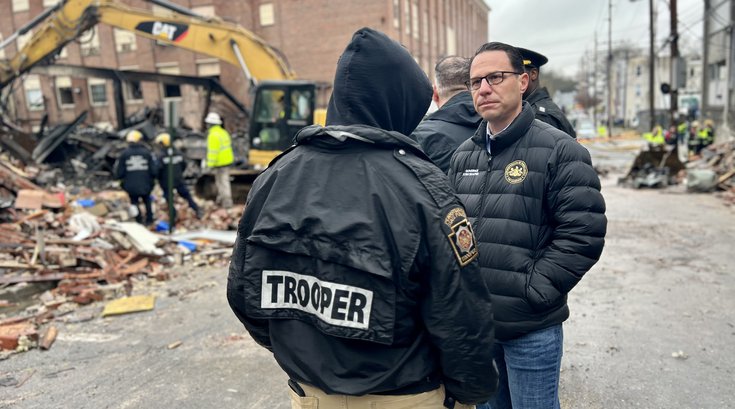 Governor Shapiro with first responders at West Reading factory explosion site.
