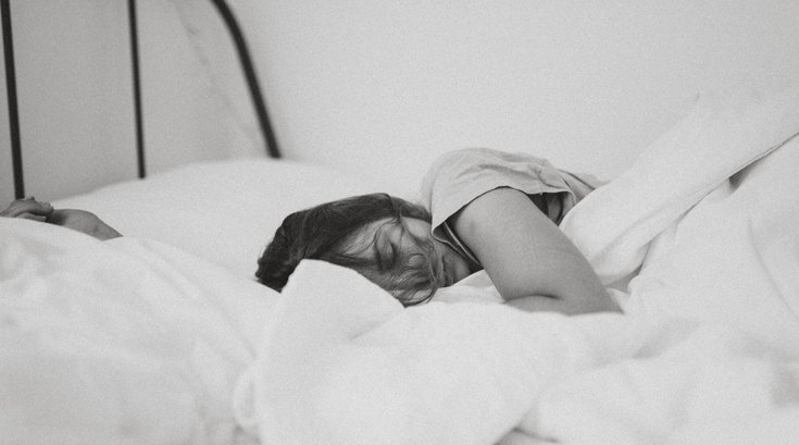 Woman sleeping in bed