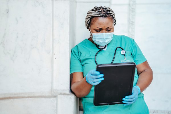 Nurse reviewing medical records