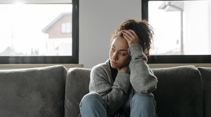 An anxious person overthinking about things