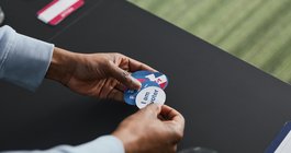 A Volunteer Working on Election Day with Stickers