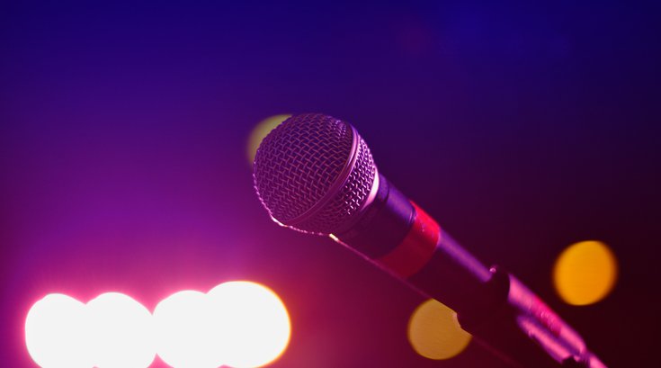 Open Mic with Lights in Background