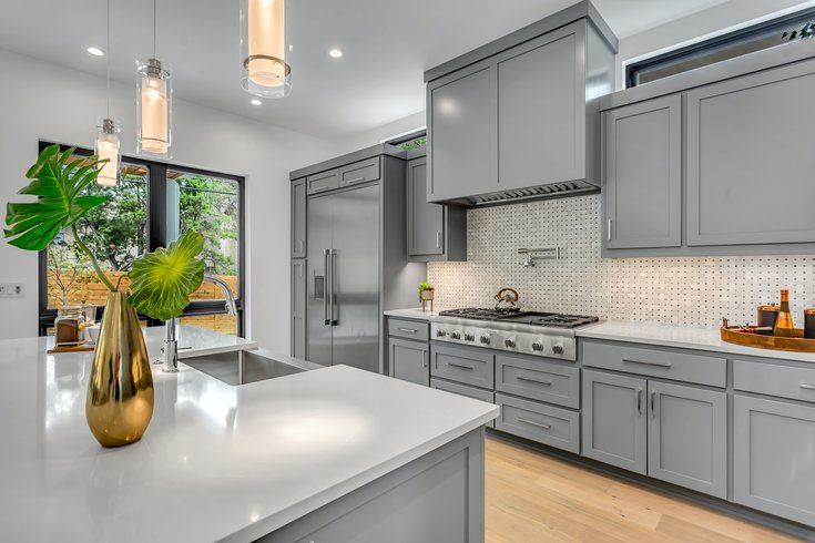 Renovated modern kitchen with gray cabinets