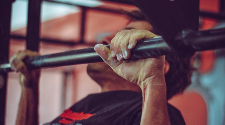 struggling to lift weights at gym