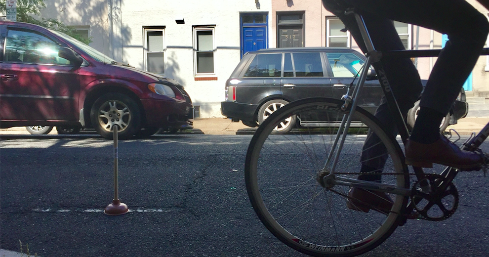 Why More Than 50 Plungers Mysteriously Appeared Along A Center City 