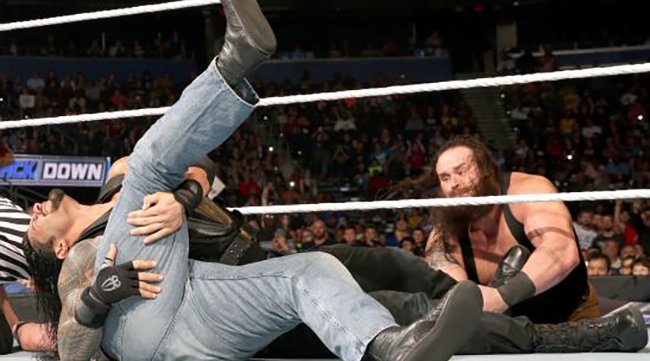 012916_reignsstrowman_WWE