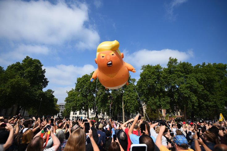 TRump balloon over crowd in London