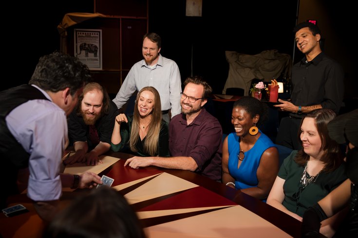 A magician performs during "The Magicians Table"