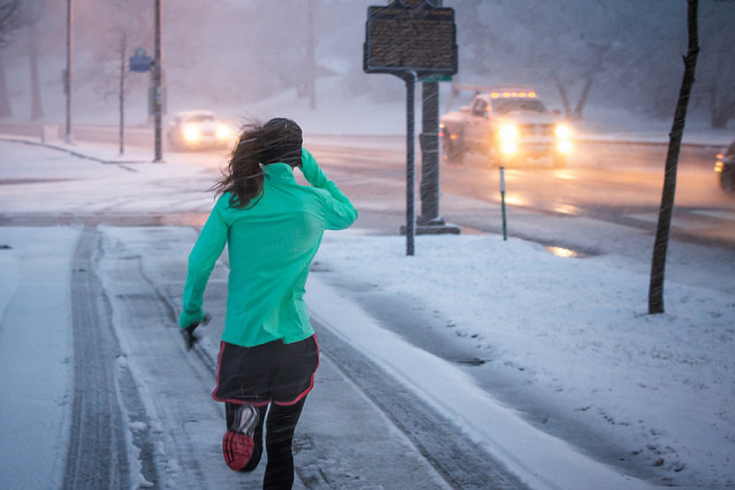 Woman running in winter weather