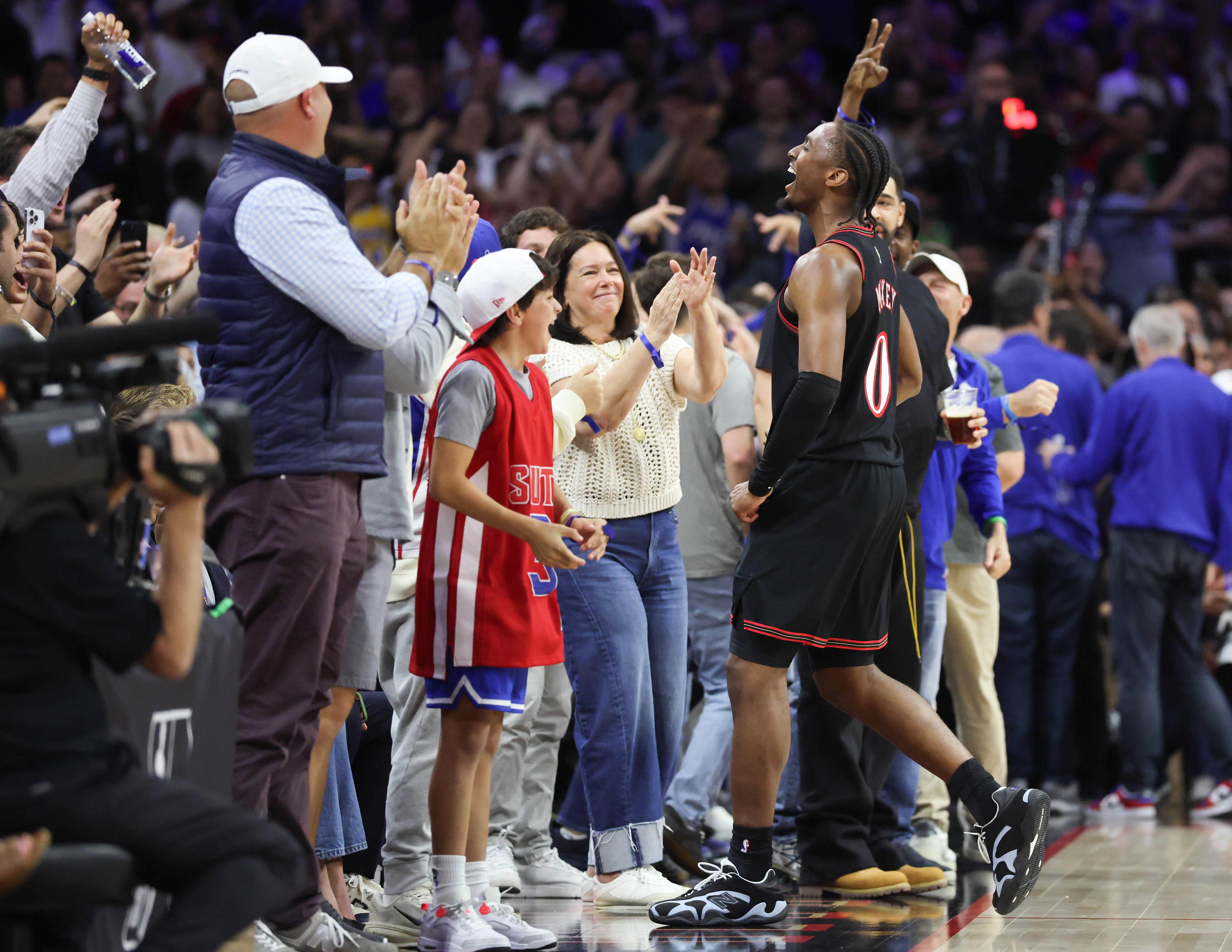With 'huge lift' from Joel Embiid's surprise, Tyrese Maxey follows through on promise, leading Sixers to playoffs